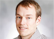 JUSTIN AHRENS